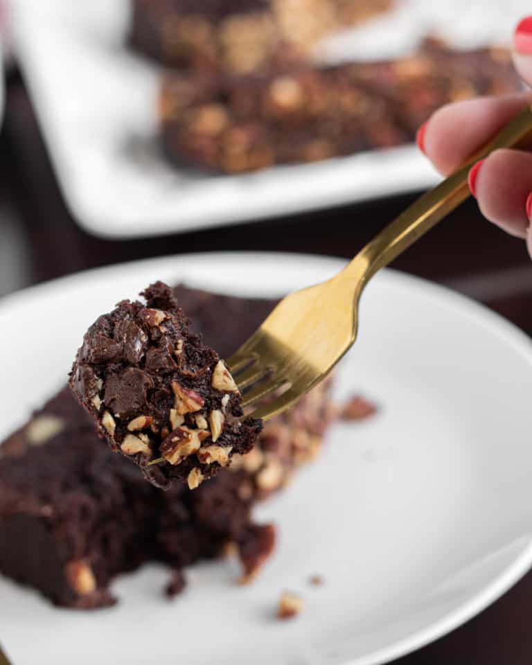 bite of double chocolate pecan banana bread on a fork